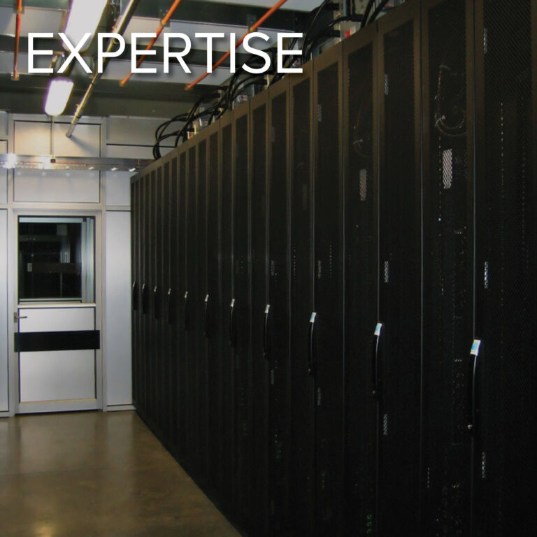 Expertise Button Image. the word Expertise overlays an image of Data center equipment.
